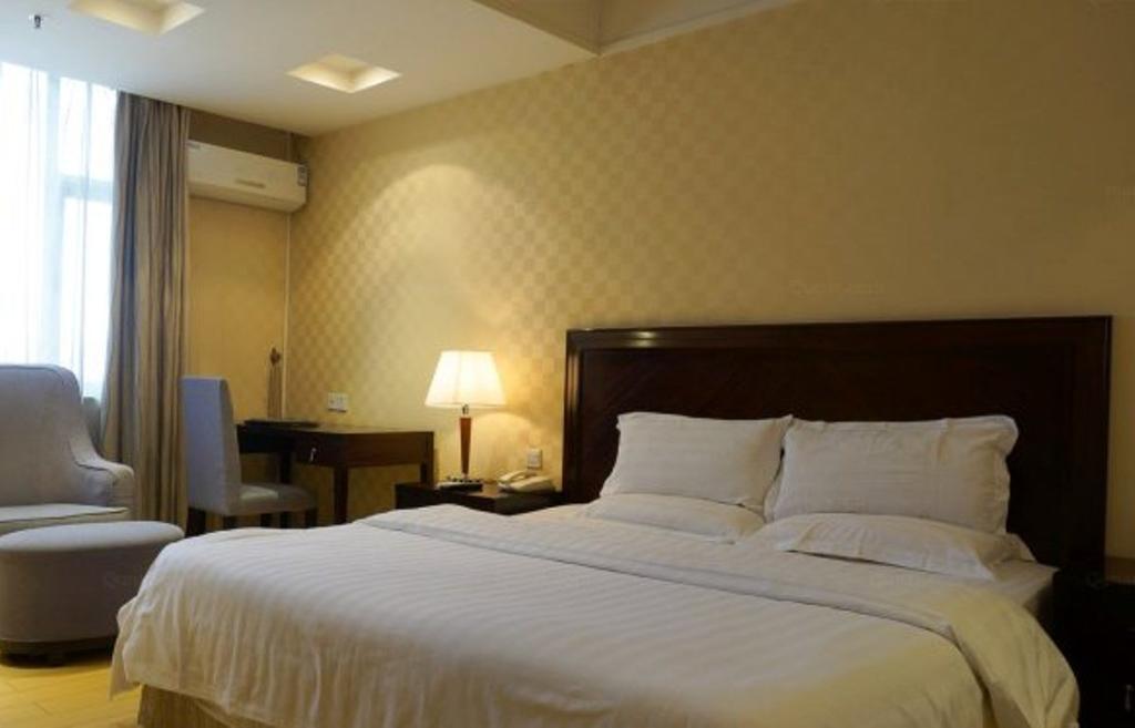 Yingfeng Hotel Tung-kuan Pokoj fotografie