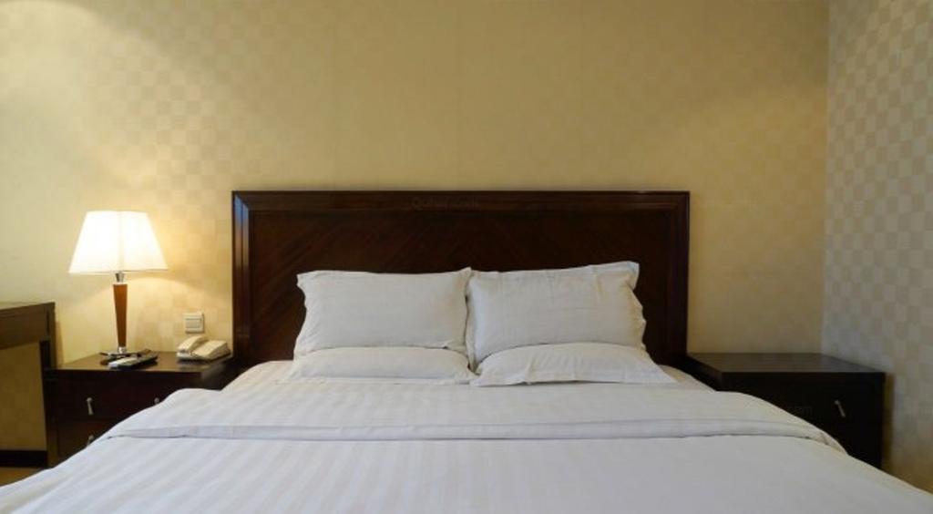 Yingfeng Hotel Tung-kuan Pokoj fotografie